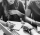 closeup-diverse-group-friends-sitting-together-grayscale